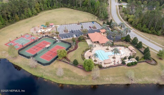 1637 Fenton Ave, Saint Johns, FL 32259 - drone / aerial view of a pool area, a nearby body of water, and a heavily wooded area