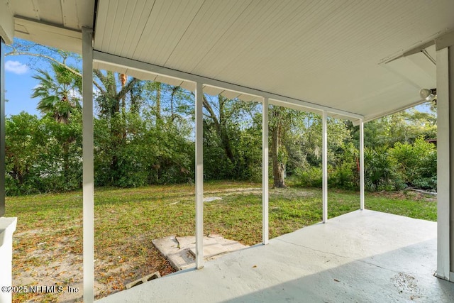 unfurnished sunroom featuring a healthy amount of sunlight