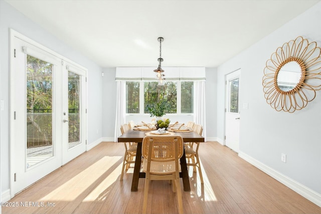 sunroom with plenty of natural light and french doors