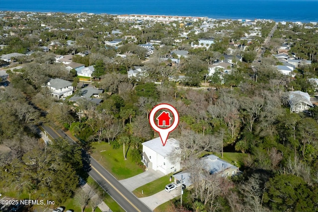 bird's eye view with a residential view and a water view