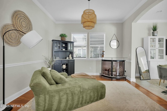163 Medio Dr, Saint Augustine, FL 32095 - living area featuring ornamental molding and wood finished floors