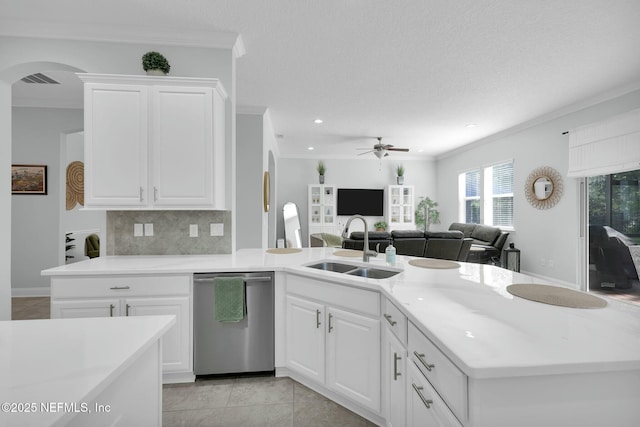 163 Medio Dr, Saint Augustine, FL 32095 - kitchen featuring backsplash, open floor plan, ornamental molding, stainless steel dishwasher, and a sink