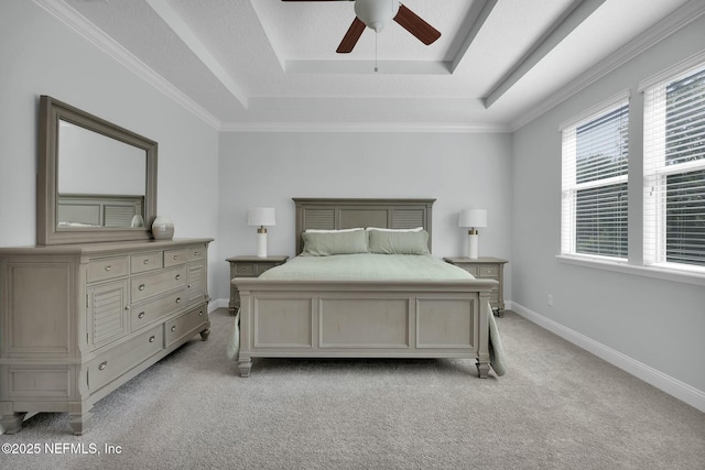 163 Medio Dr, Saint Augustine, FL 32095 - bedroom with light colored carpet, baseboards, a tray ceiling, and a ceiling fan