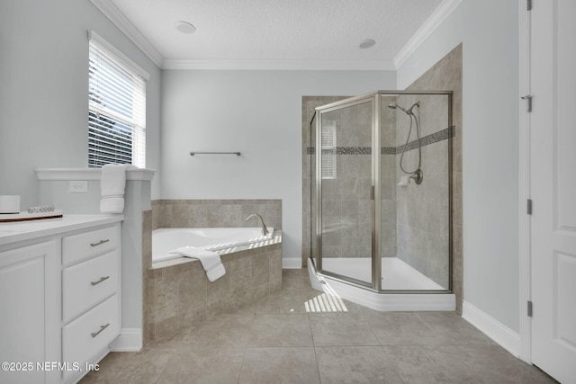 163 Medio Dr, Saint Augustine, FL 32095 - full bathroom with crown molding, vanity, a stall shower, a bath, and a textured ceiling