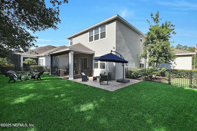 163 Medio Dr, Saint Augustine, FL 32095 - back of property featuring a yard, a sunroom, and fence