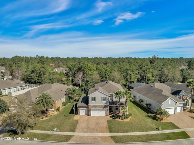163 Medio Dr, Saint Augustine, FL 32095 - bird's eye view featuring a residential view and a wooded view