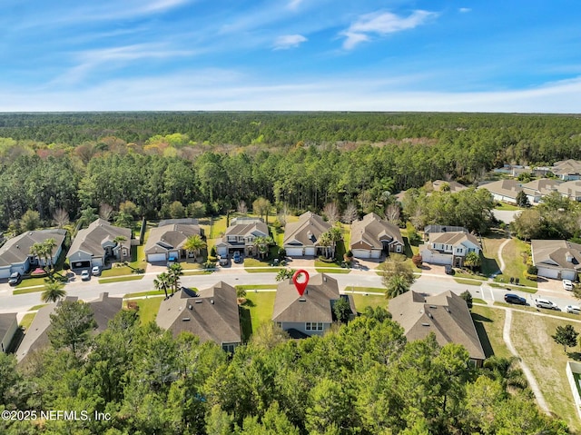 163 Medio Dr, Saint Augustine, FL 32095 - drone / aerial view featuring a residential view and a wooded view