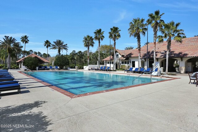 163 Medio Dr, Saint Augustine, FL 32095 - community pool with a patio area