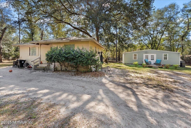 view of front of home featuring french doors