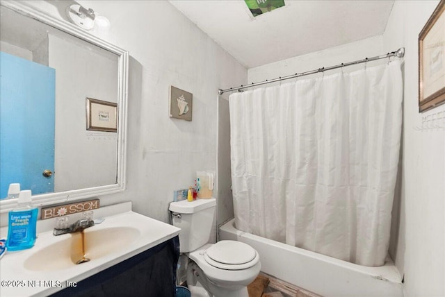 full bath featuring shower / tub combo, toilet, and vanity