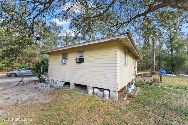 view of side of property featuring an outdoor structure