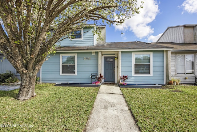 view of front facade with a front lawn