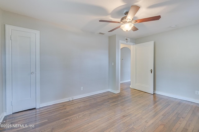 4059 College St, Jacksonville, FL 32205 - empty room featuring a ceiling fan, baseboards, visible vents, and wood finished floors