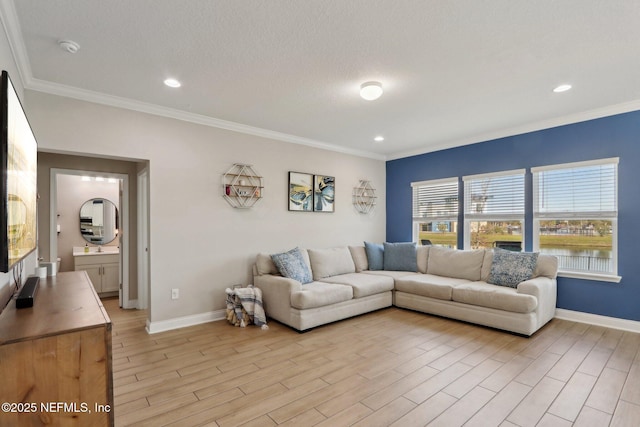 living room with recessed lighting, crown molding, light wood-type flooring, and baseboards