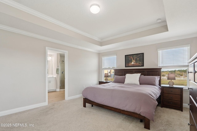 bedroom featuring light colored carpet, crown molding, a raised ceiling, and baseboards