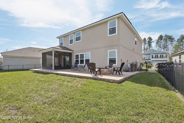 back of property with stucco siding, a lawn, a patio, a fenced backyard, and cooling unit