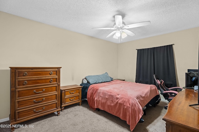 bedroom with light carpet, a textured ceiling, and ceiling fan