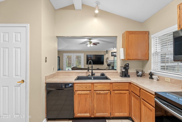 kitchen with ceiling fan, dishwasher, light countertops, lofted ceiling with beams, and a sink