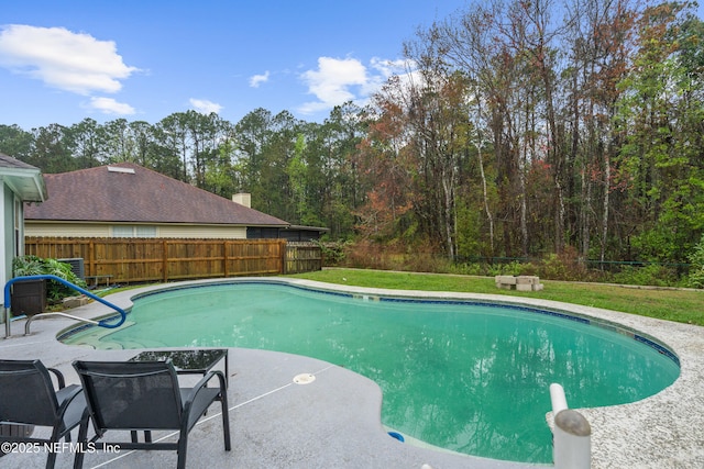 view of swimming pool with a fenced in pool, a patio, and a fenced backyard