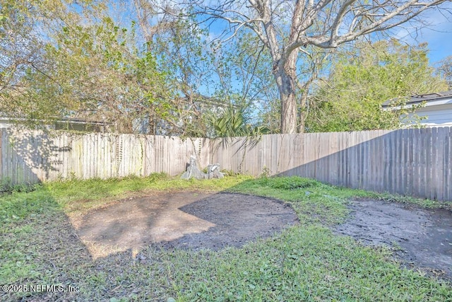 view of yard with fence