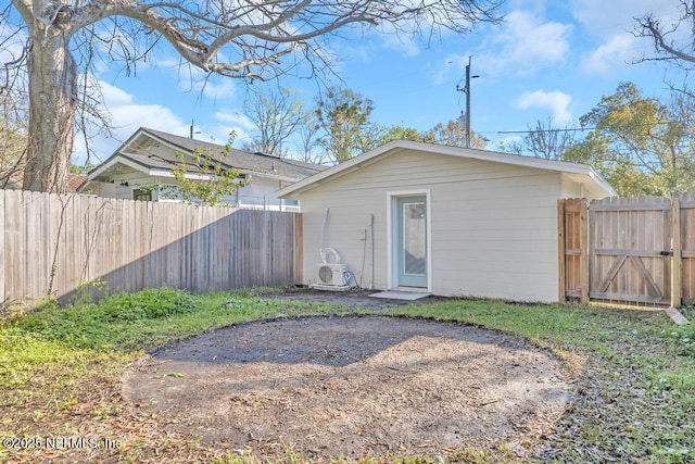 back of property with fence