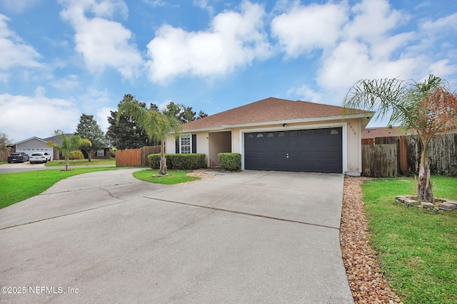 ranch-style home with stucco siding, concrete driveway, and fence