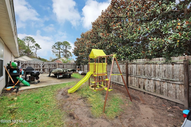 view of play area with a fenced backyard