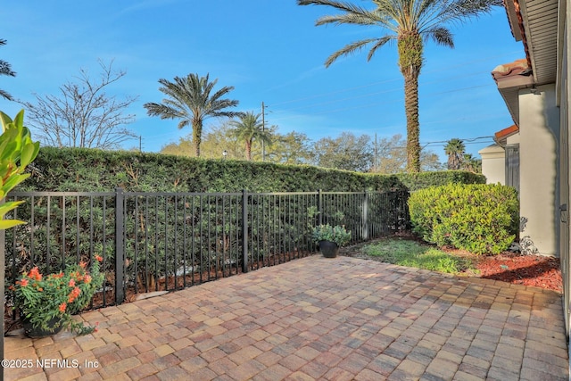 view of patio with fence