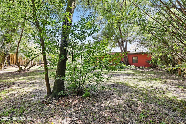 view of yard with fence