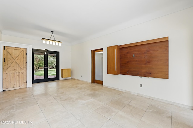 unfurnished room featuring french doors, baseboards, and light tile patterned flooring