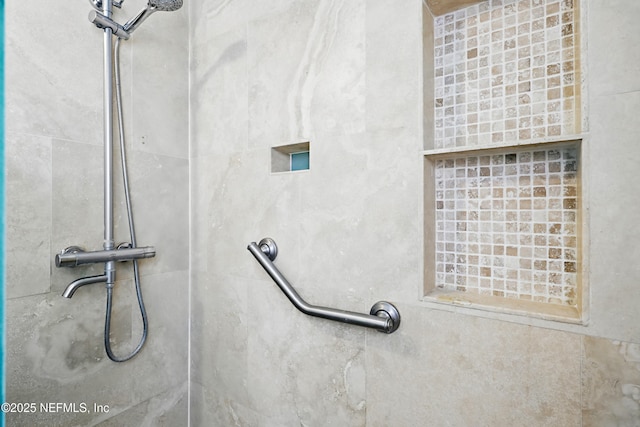 room details with a tile shower