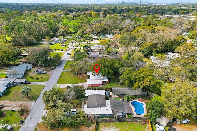 aerial view featuring a view of trees