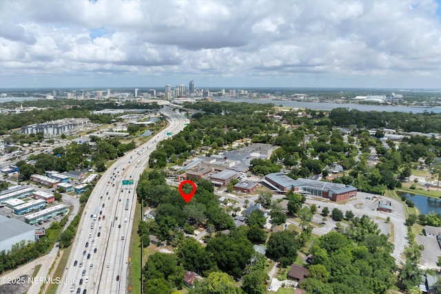 birds eye view of property featuring a water view