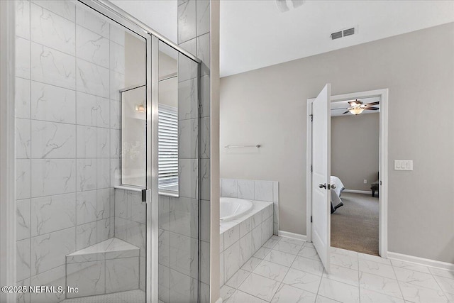 ensuite bathroom with visible vents, marble finish floor, a shower stall, baseboards, and a bath