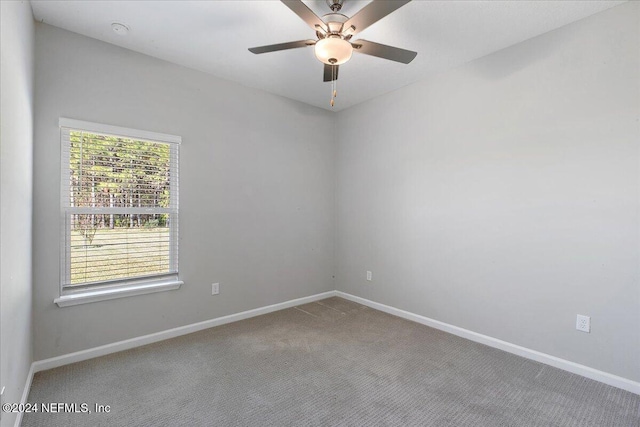 unfurnished room featuring ceiling fan, baseboards, and carpet floors