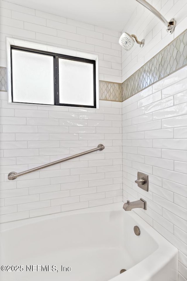 full bath featuring shower / washtub combination