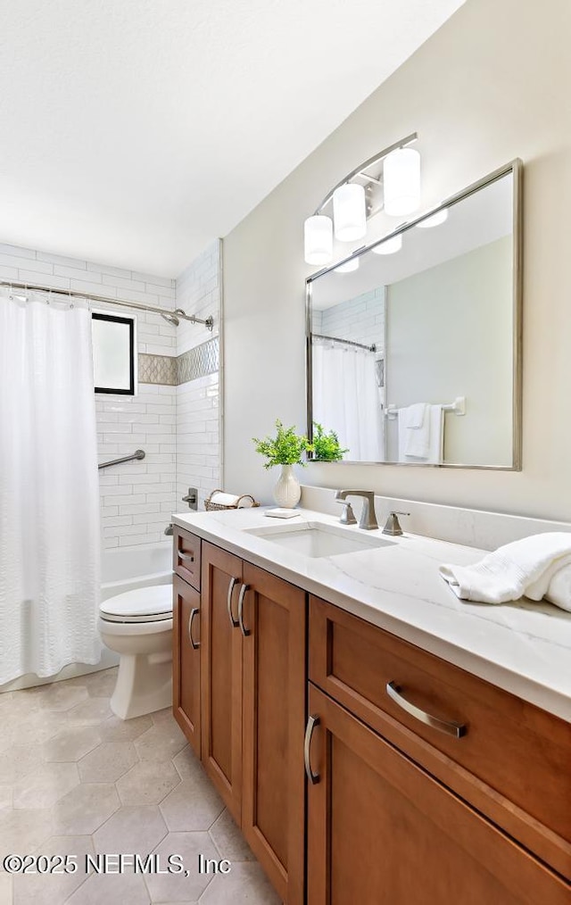 bathroom featuring vanity, shower / bath combination with curtain, toilet, and tile patterned flooring