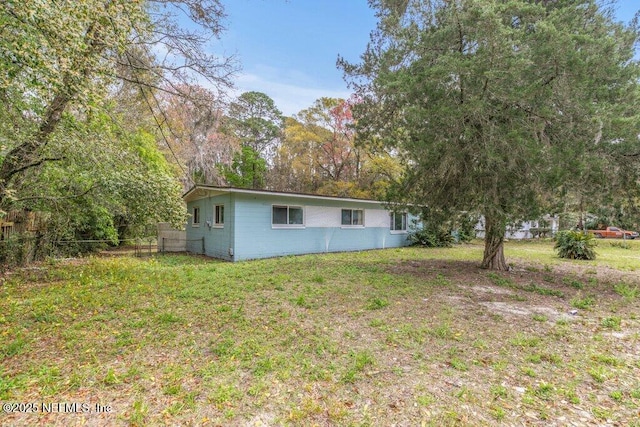 exterior space with a front yard