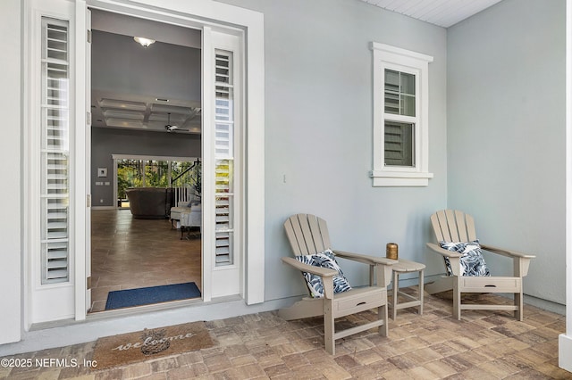 property entrance featuring stucco siding