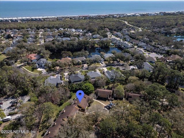 aerial view with a residential view and a water view