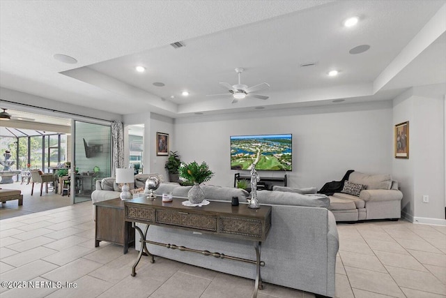 116 Clarendon Rd, Saint Johns, FL 32259 - living area with a tray ceiling, a ceiling fan, light tile patterned floors, visible vents, and recessed lighting