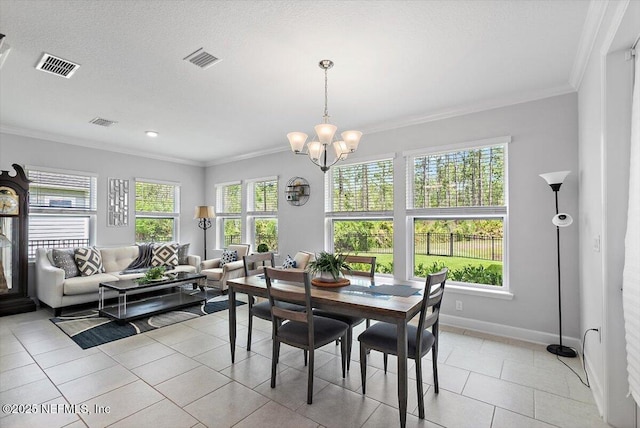 116 Clarendon Rd, Saint Johns, FL 32259 - dining space with ornamental molding, a notable chandelier, baseboards, and visible vents