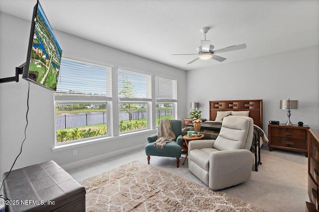 116 Clarendon Rd, Saint Johns, FL 32259 - carpeted bedroom with baseboards, ceiling fan, and a textured ceiling
