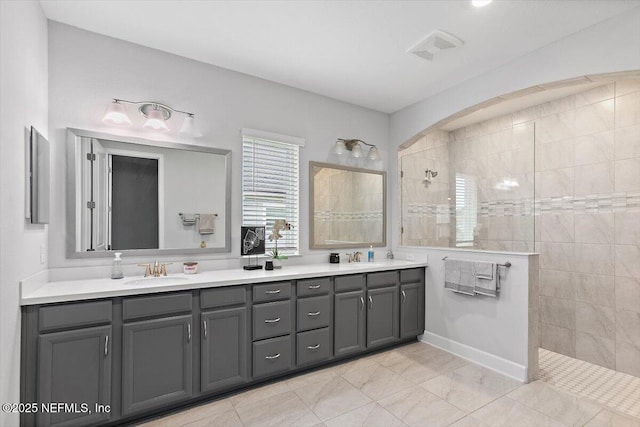 116 Clarendon Rd, Saint Johns, FL 32259 - bathroom with double vanity, a sink, and a walk in shower