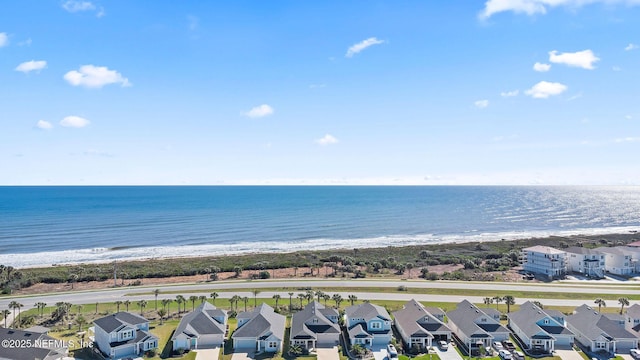 birds eye view of property with a residential view and a water view