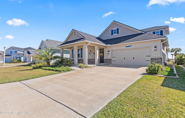 view of front facade featuring stone siding, a garage, concrete driveway, and a front lawn