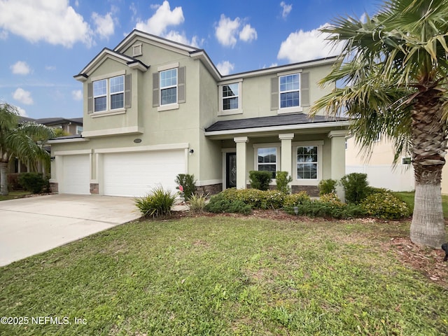 view of front of home featuring stucco siding, a front lawn, concrete driveway, and a garage