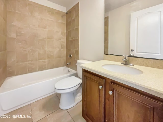 bathroom with tile patterned floors, shower / bathtub combination, toilet, and vanity