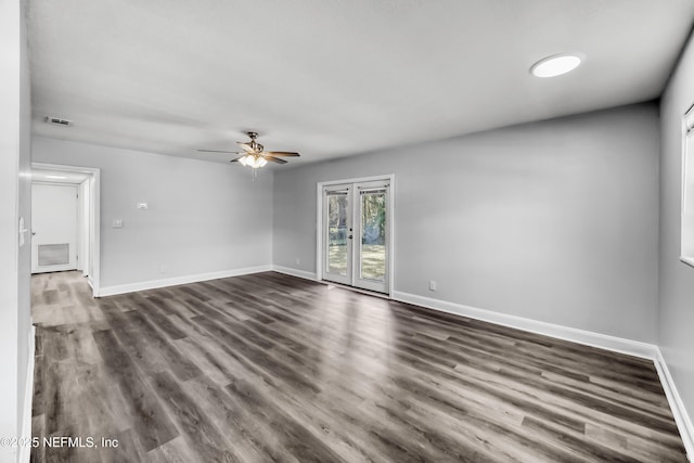 unfurnished living room with visible vents, dark wood-type flooring, french doors, baseboards, and ceiling fan