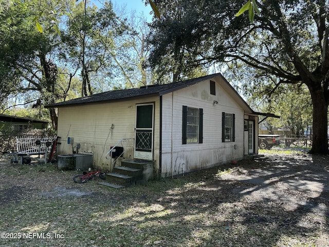 view of property exterior with central air condition unit